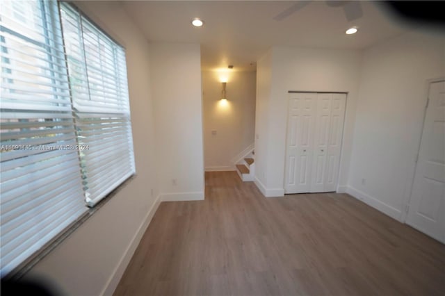 123 Harbors Way, Boynton Beach, FL 33435 - unfurnished room featuring light wood-style flooring, baseboards, a ceiling fan, and recessed lighting