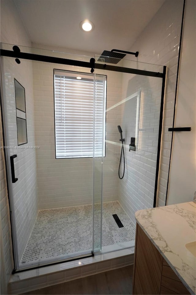 123 Harbors Way, Boynton Beach, FL 33435 - bathroom with a shower stall, vanity, and wood finished floors
