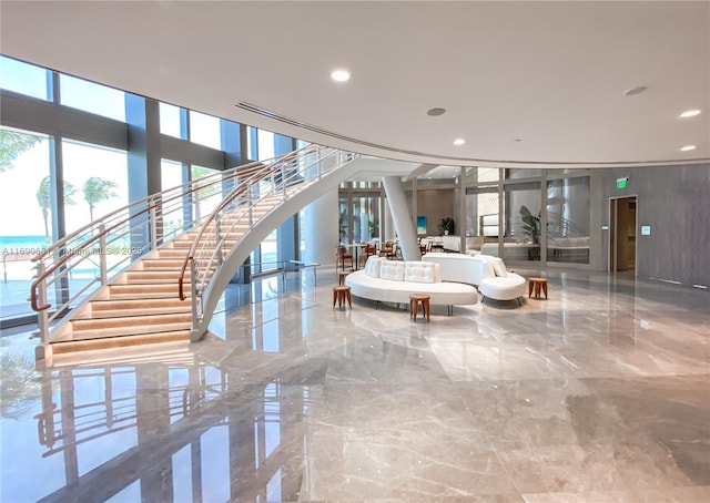 building lobby featuring a water view