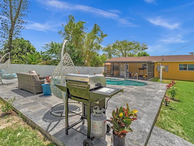 view of patio featuring a fenced in pool