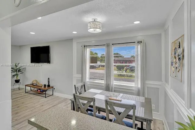 dining room with light hardwood / wood-style floors