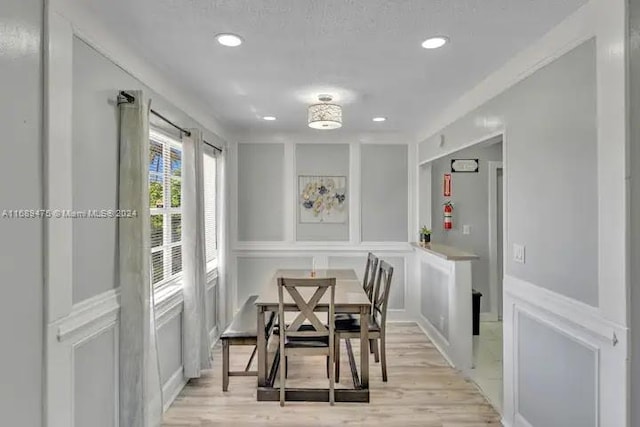 dining room featuring light hardwood / wood-style flooring