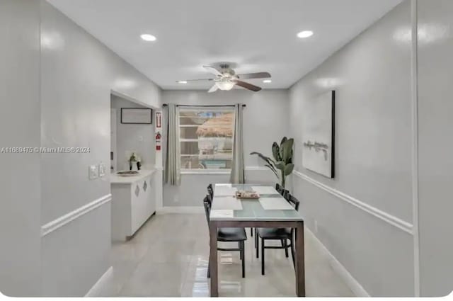 dining area with ceiling fan