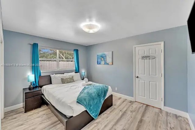 bedroom featuring light hardwood / wood-style floors