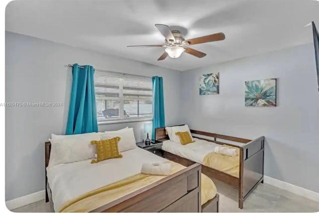 bedroom featuring ceiling fan