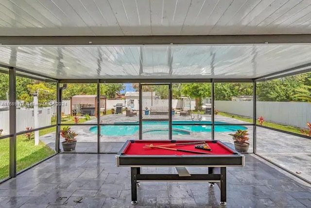 sunroom with pool table and wooden ceiling