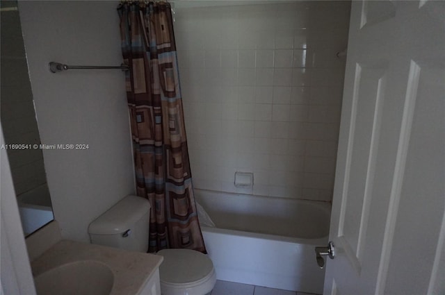 full bathroom with tile patterned floors, vanity, toilet, and shower / tub combo