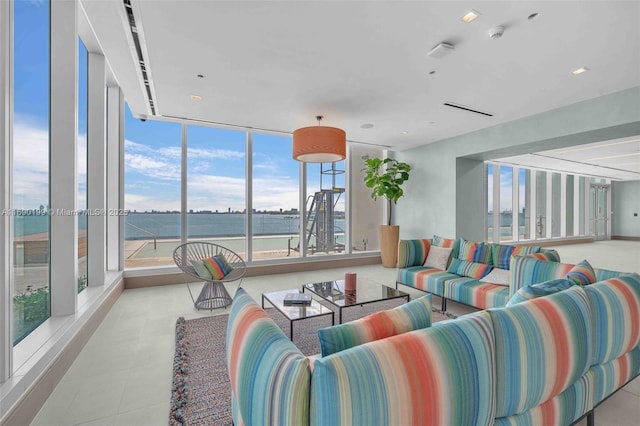 living room featuring a water view