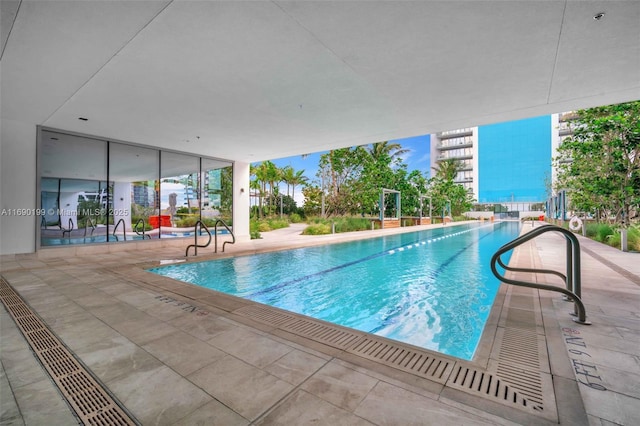 view of pool featuring a patio area