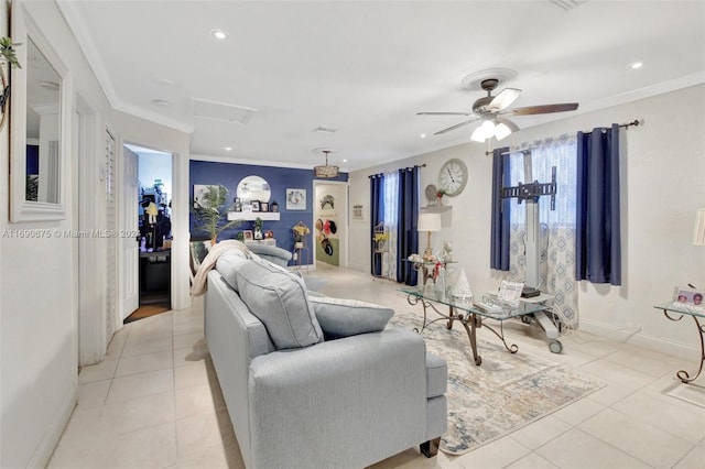 tiled living room featuring ceiling fan and crown molding