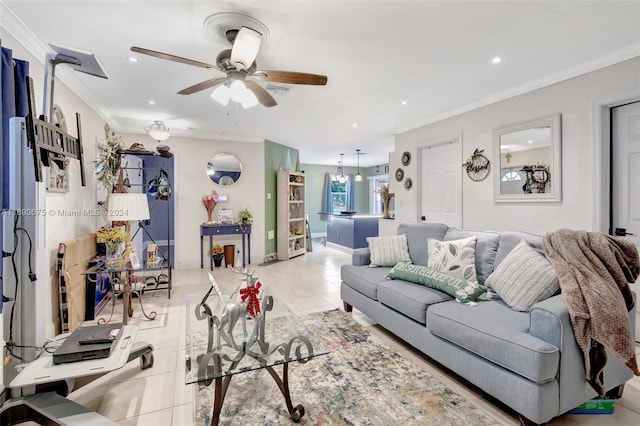 tiled living room featuring ceiling fan and ornamental molding