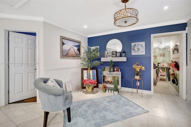 living area featuring light tile patterned floors and crown molding