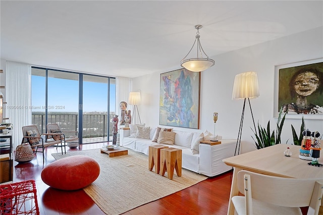 780 NE 69th St Unit 2506, Miami, FL 33138 - living room with dark wood-style flooring and a wall of windows