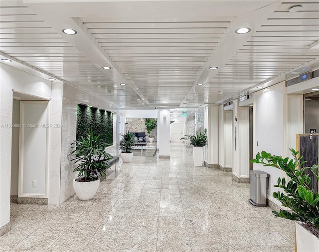 780 NE 69th St Unit 2506, Miami, FL 33138 - building lobby featuring recessed lighting