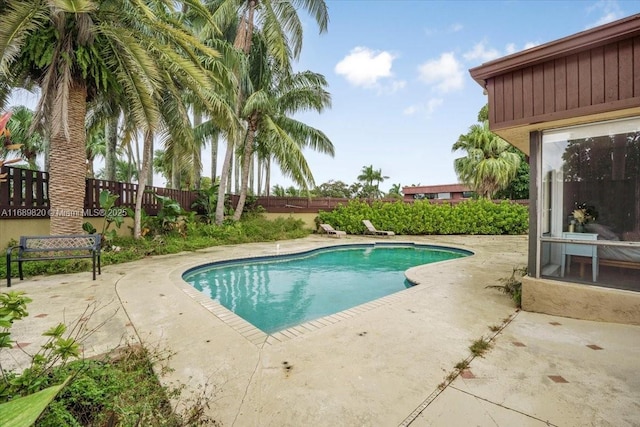 view of pool with a patio area, a fenced in pool, and a fenced backyard