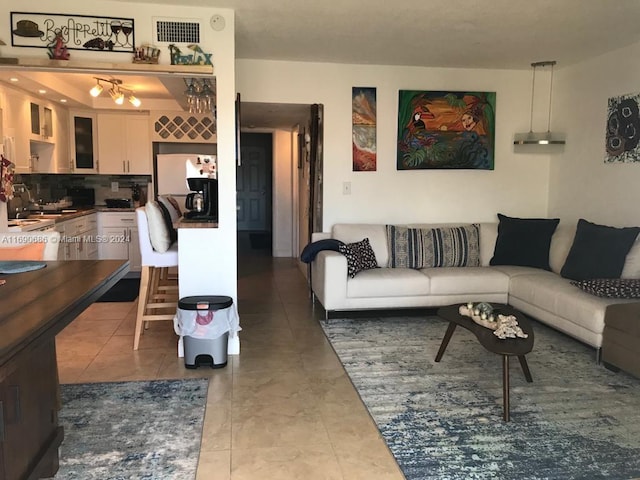 tiled living room with sink