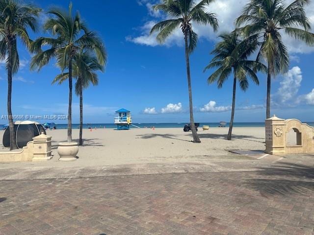 view of water feature with a beach view