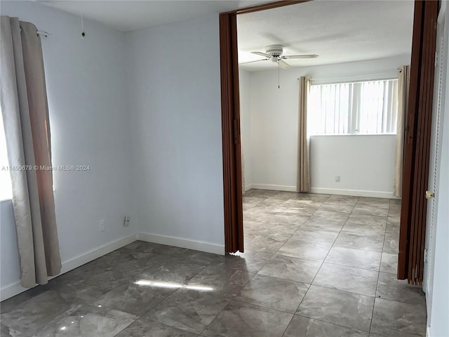 empty room with ceiling fan