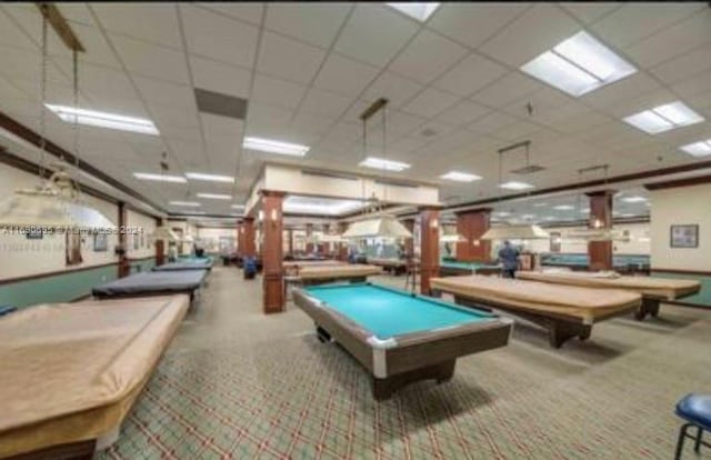 playroom with a paneled ceiling, light colored carpet, and billiards