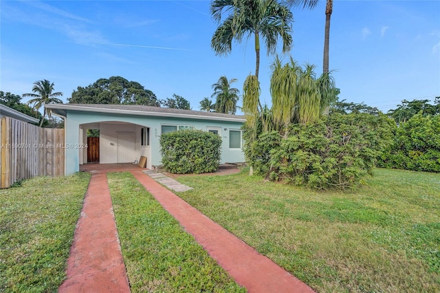 view of yard featuring a carport