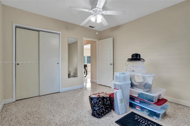 miscellaneous room featuring ceiling fan