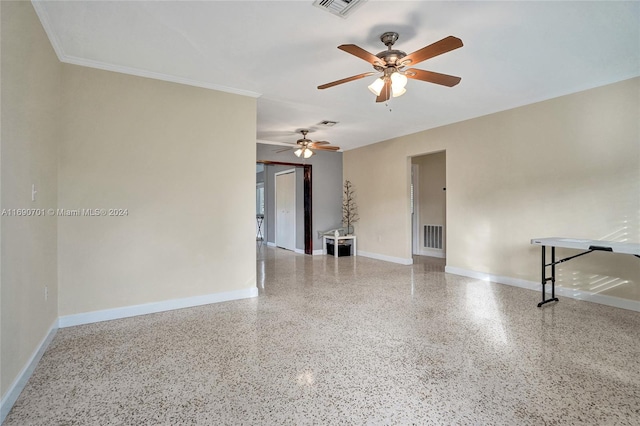 unfurnished room with ceiling fan and ornamental molding