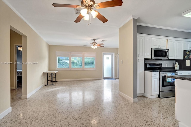 kitchen featuring white cabinets, ceiling fan, ornamental molding, and appliances with stainless steel finishes