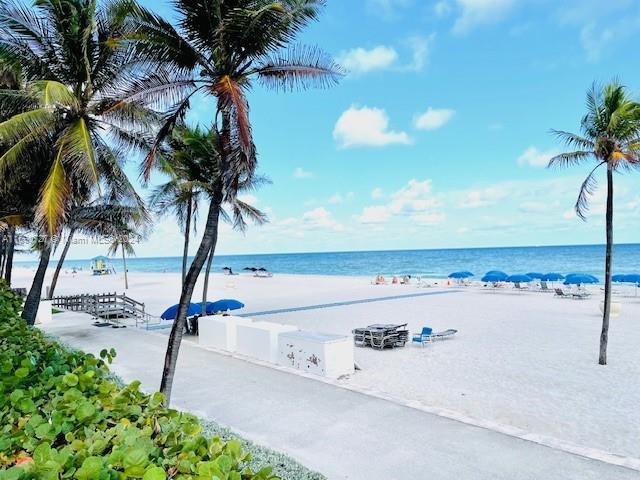 property view of water featuring a view of the beach