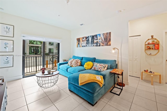 living room featuring light tile patterned flooring