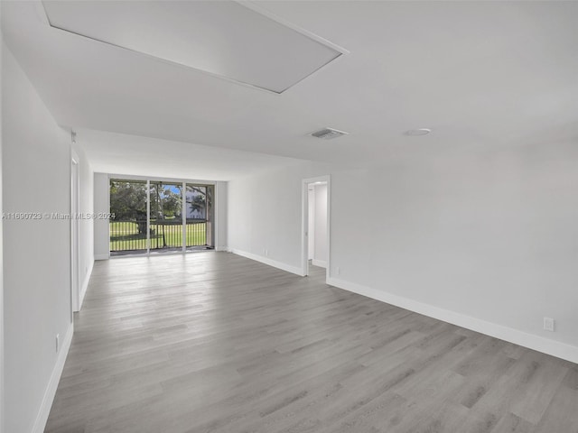 empty room with light wood-type flooring