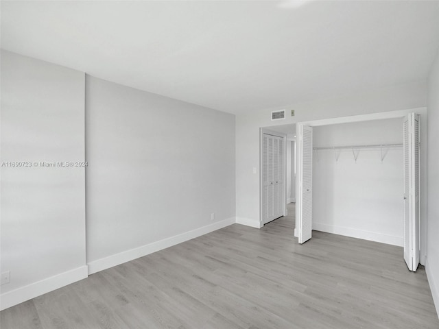 unfurnished bedroom featuring light hardwood / wood-style flooring