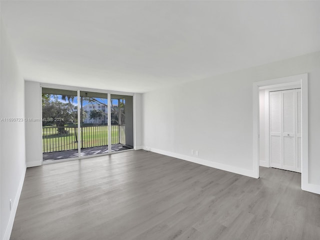 empty room featuring hardwood / wood-style floors