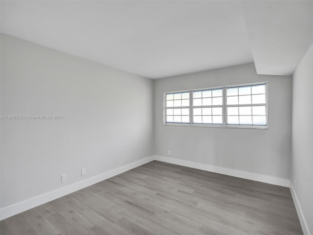 empty room with light wood-type flooring