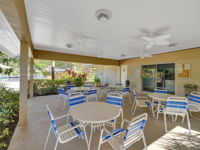 view of patio featuring ceiling fan