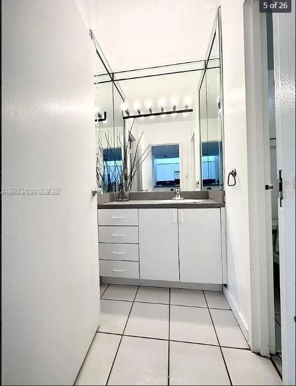 bathroom featuring vanity and tile patterned floors