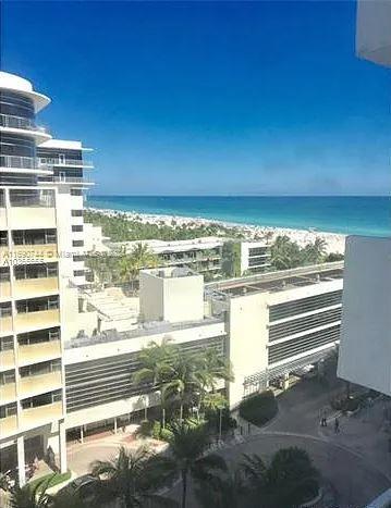 water view featuring a beach view