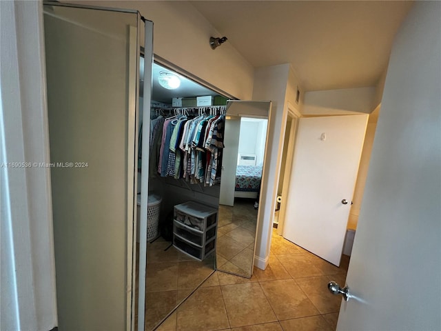 hallway with light tile patterned flooring