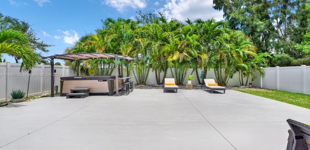 view of patio featuring a hot tub