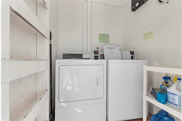 laundry room with independent washer and dryer
