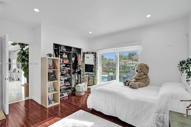 bedroom featuring hardwood / wood-style flooring