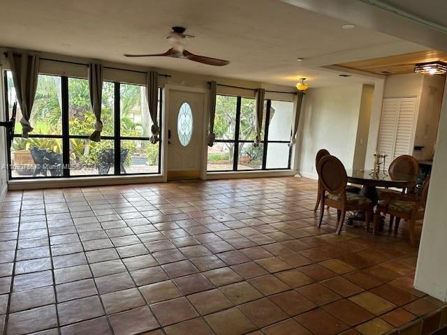 interior space featuring ceiling fan