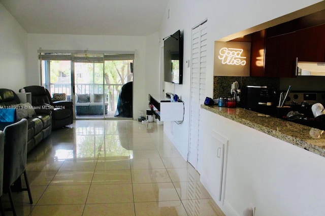 living room featuring light tile patterned floors