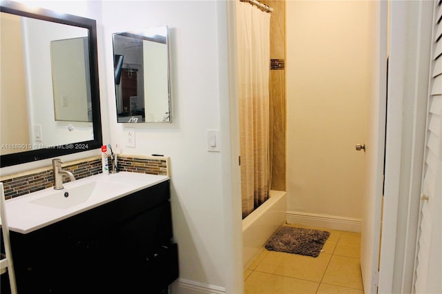 bathroom with shower / tub combo, vanity, decorative backsplash, and tile patterned flooring