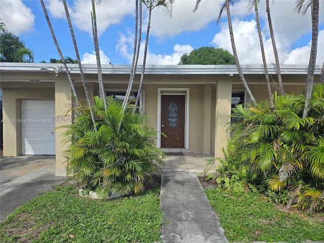 entrance to property featuring a garage