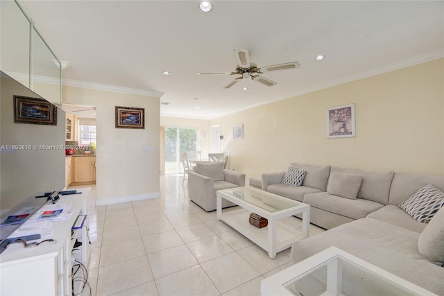 living room featuring light tile patterned flooring, ceiling fan, and ornamental molding