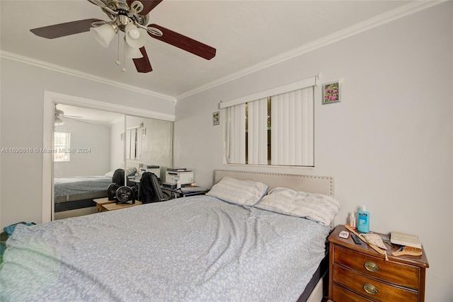 bedroom with ceiling fan, a closet, and crown molding