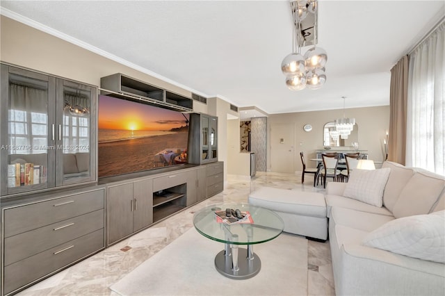 living room featuring an inviting chandelier and crown molding