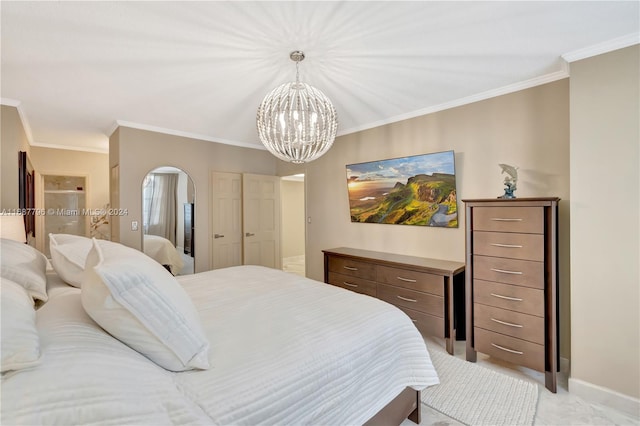 bedroom with light colored carpet, crown molding, and an inviting chandelier