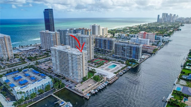 drone / aerial view with a water view