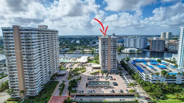 birds eye view of property featuring a water view